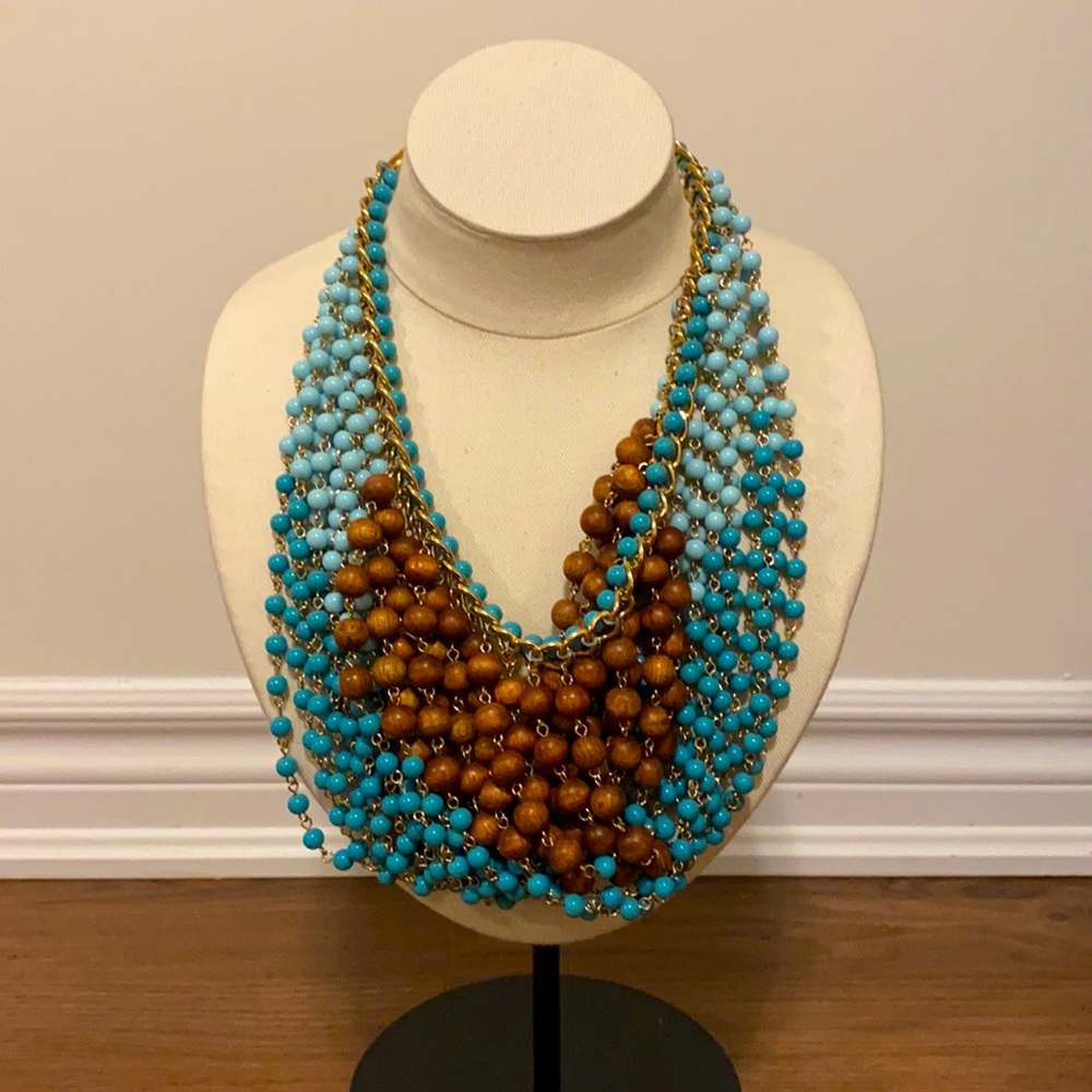 Multi coloured and multi strand bead necklace.